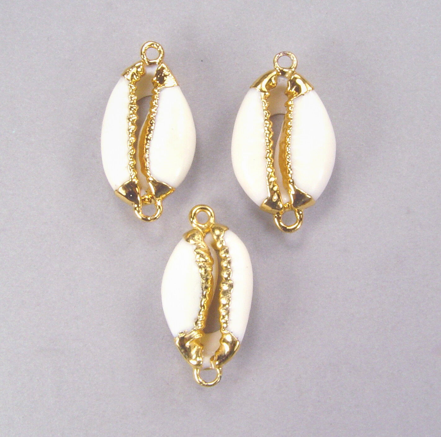 Quantity Discount: Cowry Shell Connectors with Trimmed Jaws